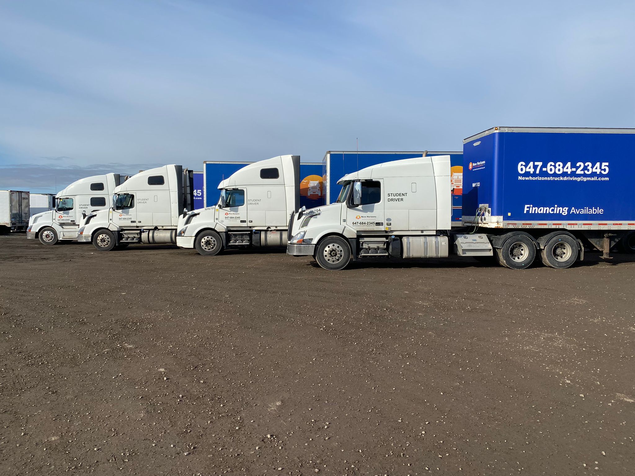 New Horizons fleet of four Volvo tractors lined up at the training yard